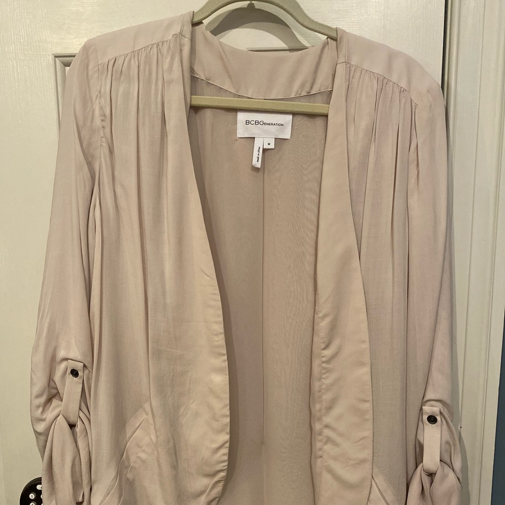 BCBG shrug top. Super cute with leather pants or faux leather leggings. Clean